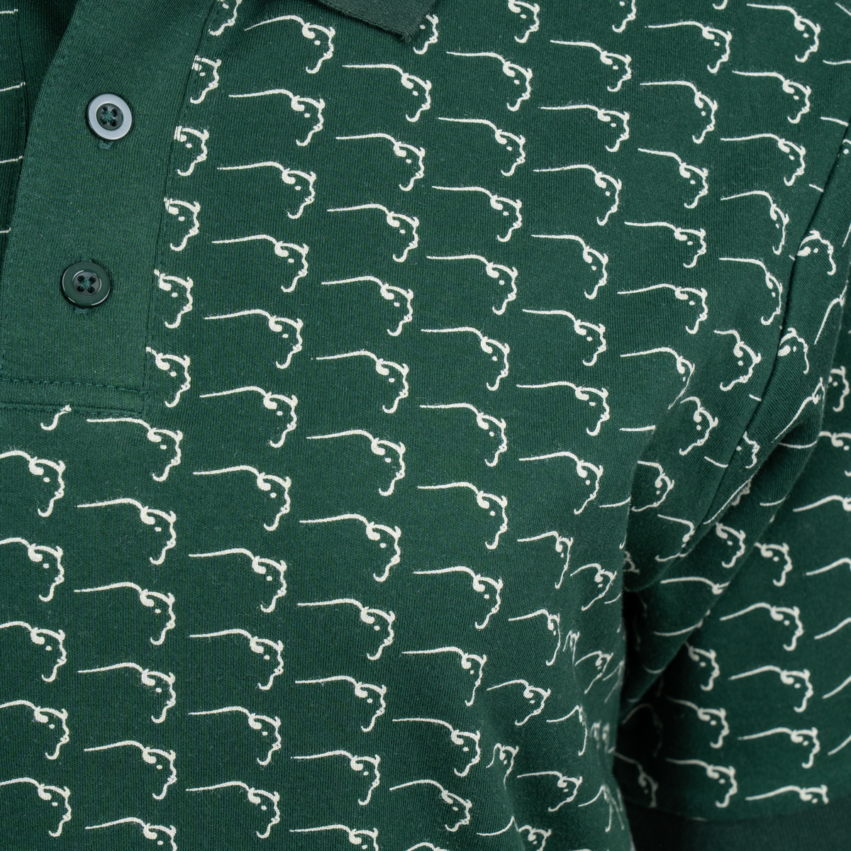 Buffalo Trace Allover Swoosh Polo close-up of allover swoosh print and polo collar detail