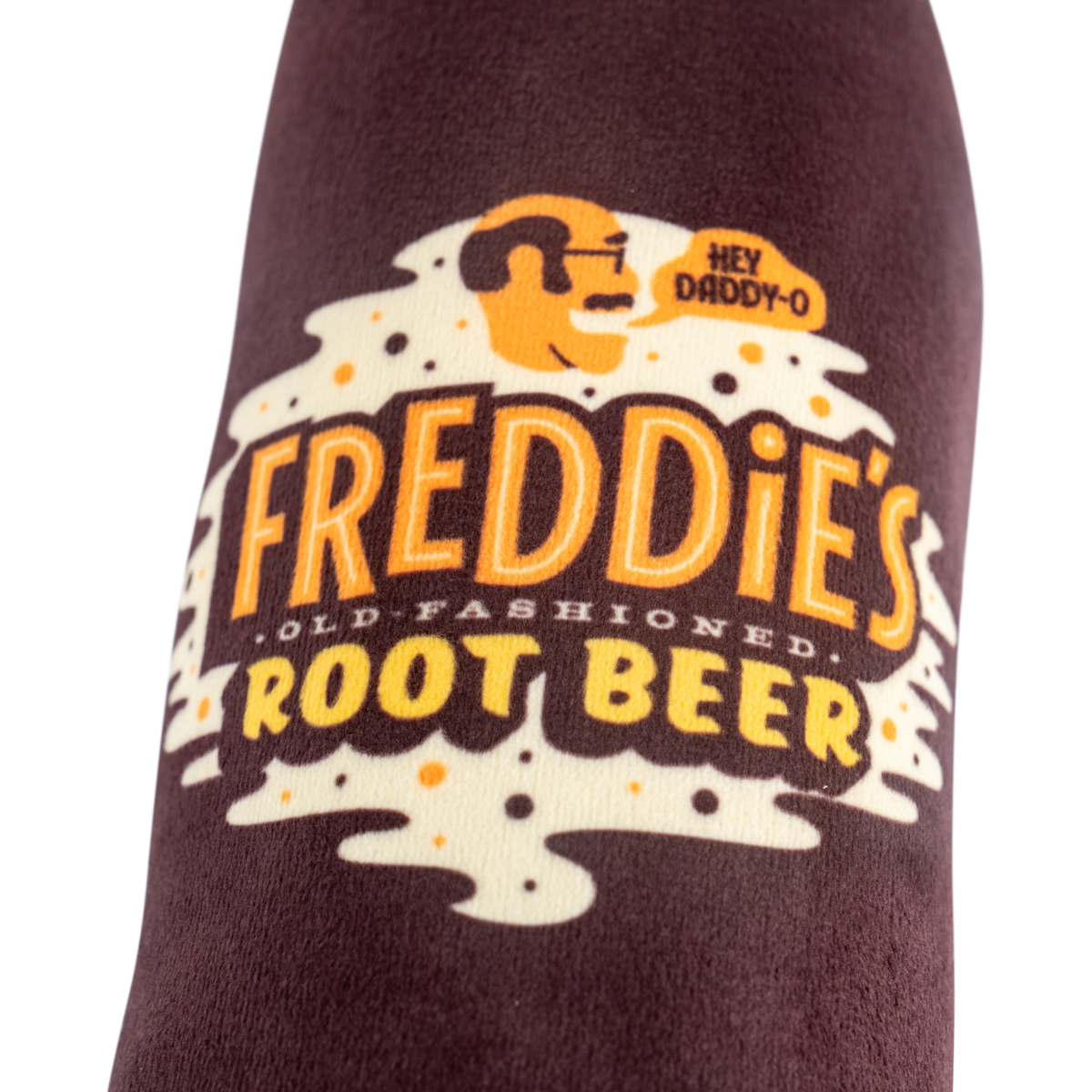 Buffalo Trace Plush Root Beer Dog Toy close-up of embroidered Freddie's root beer label