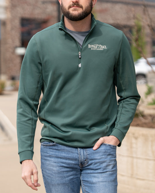 Buffalo Trace Cutter and Buck Quarter-Zip close-up of embroidered logo and premium performance fabric
