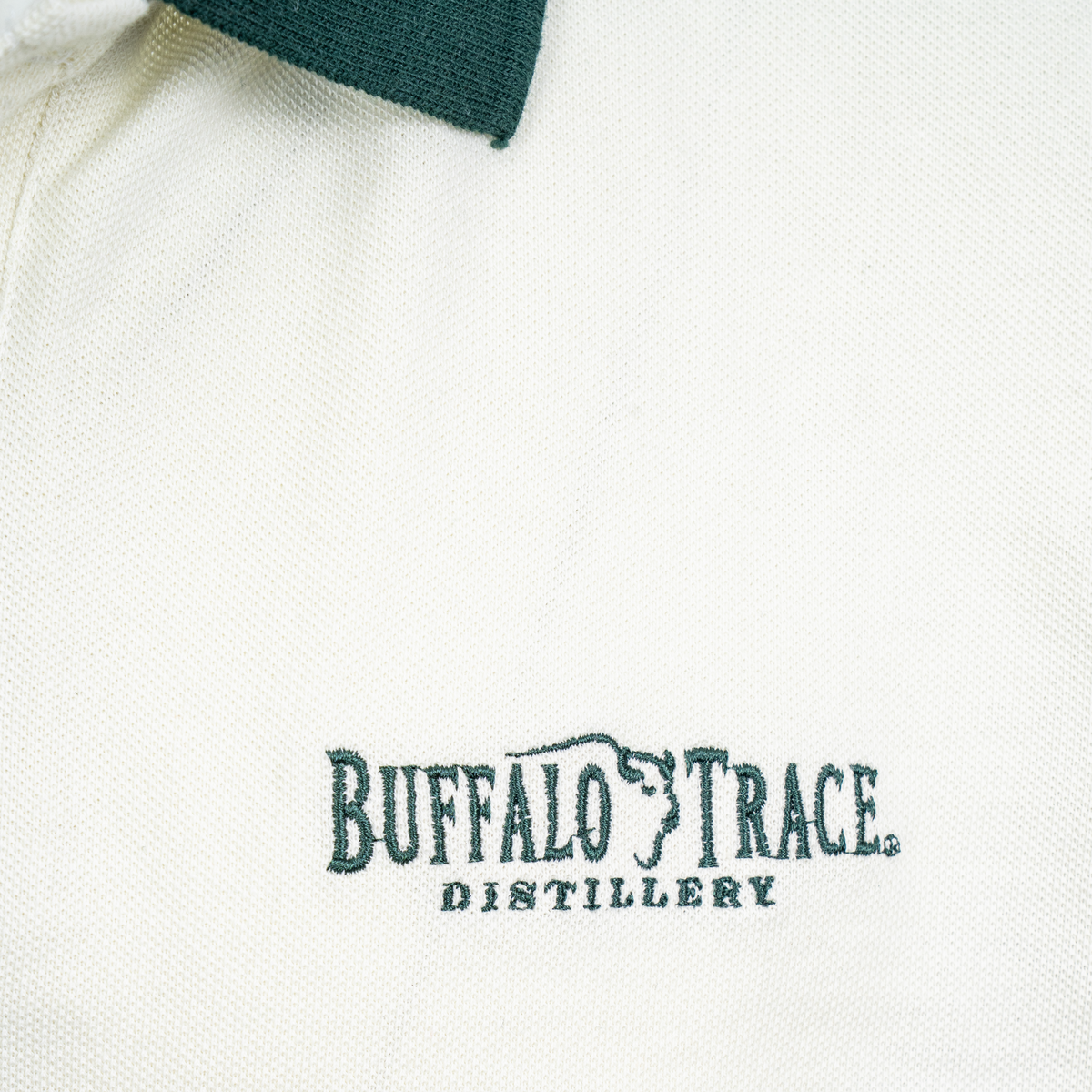 Buffalo Trace Engineered Striped Polo close-up of engineered stripe detail and embroidered logo
