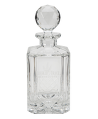 Clear glass Buffalo Trace decanter with a spherical stopper on a white background