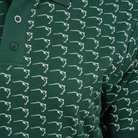 Buffalo Trace Allover Swoosh Polo close-up of allover swoosh print and polo collar detail