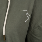 Buffalo Trace Women's Swoosh Hoodie close-up of embroidered swoosh logo and kangaroo pocket