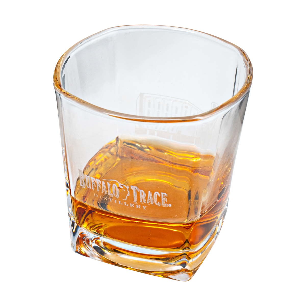 Buffalo Trace Etched Square Rocks Glass with bourbon on wooden surface lifestyle shot