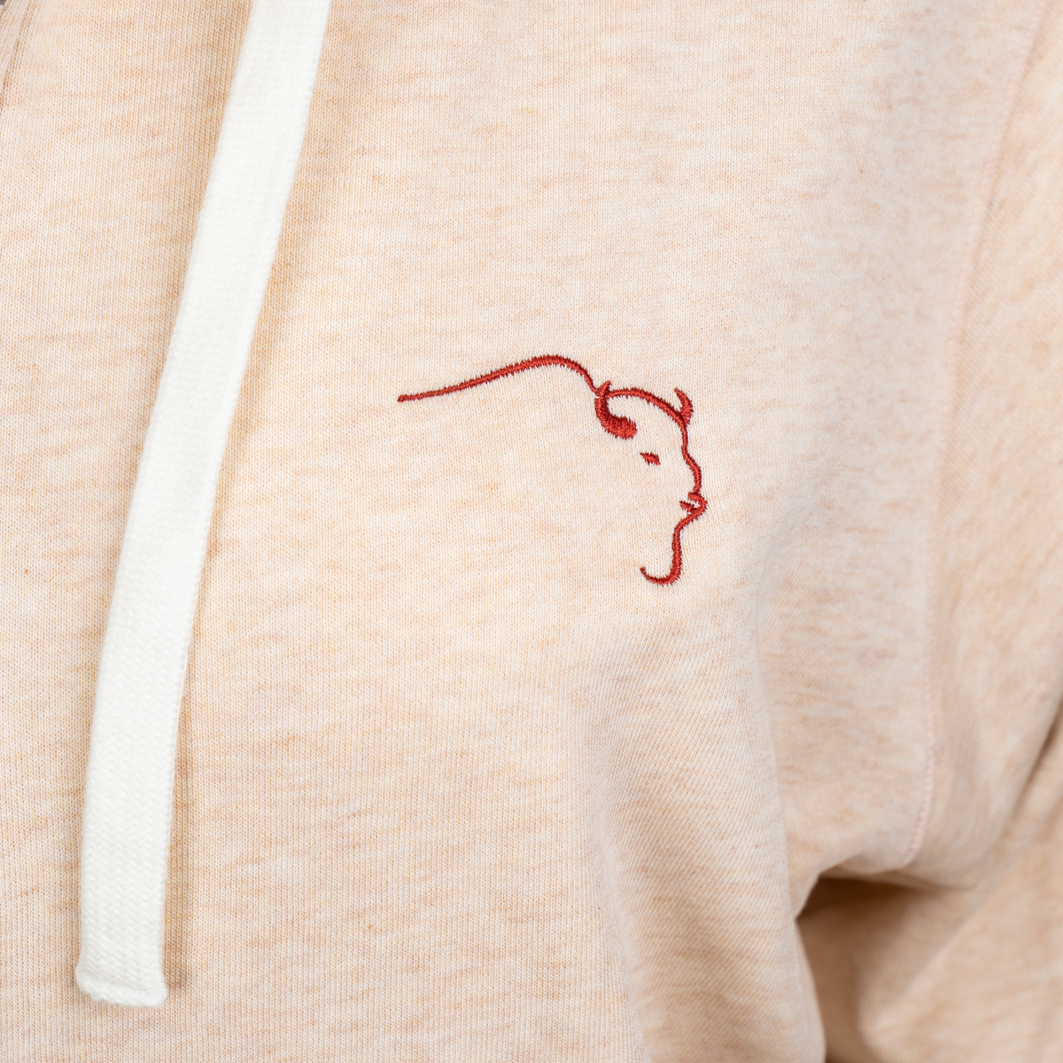 Buffalo Trace Stadium Zip-Up Cream Hoodie close-up of chest logo and zip detail by TASC